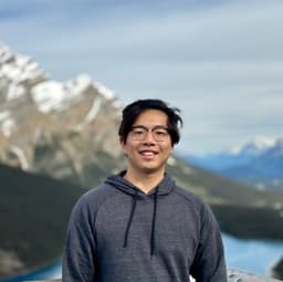Harry Ye hiking in the mountains